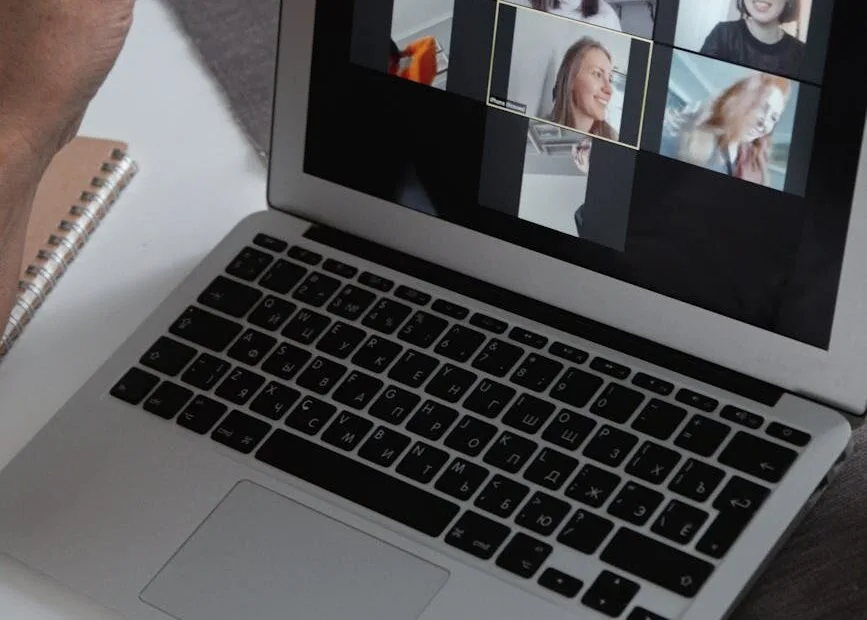 a group of people chatting in a video call in a laptop